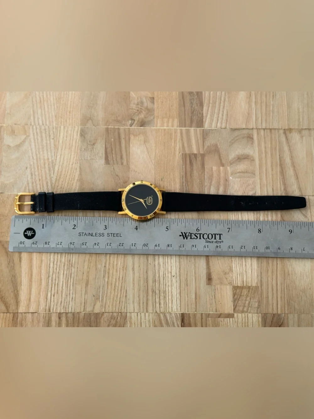 General Tire Dress Watch Black Dial Leather Strap Gold-Tone Case Hands